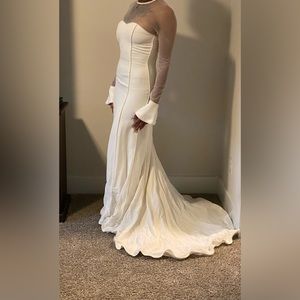 Elegant never worn wedding dress, from Alegria’s Brides, size 4, Ivory.